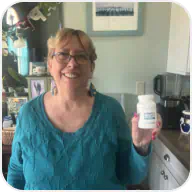 Customer photo holding product bottle